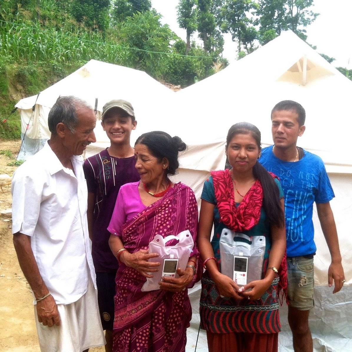 Group of people receive lights.