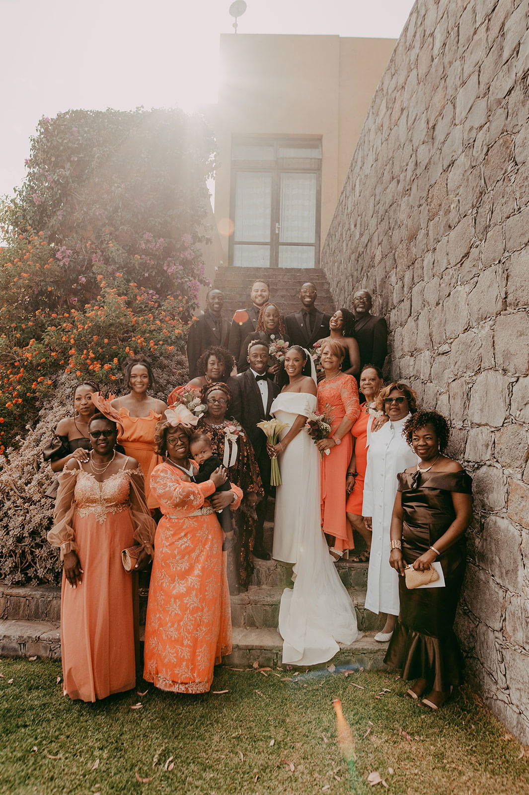 Wedding party gathered with Bride and Groom