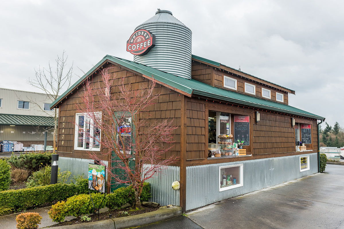 Whidbey Coffee store with shingle siding and a silo in Mukilteo, Washington