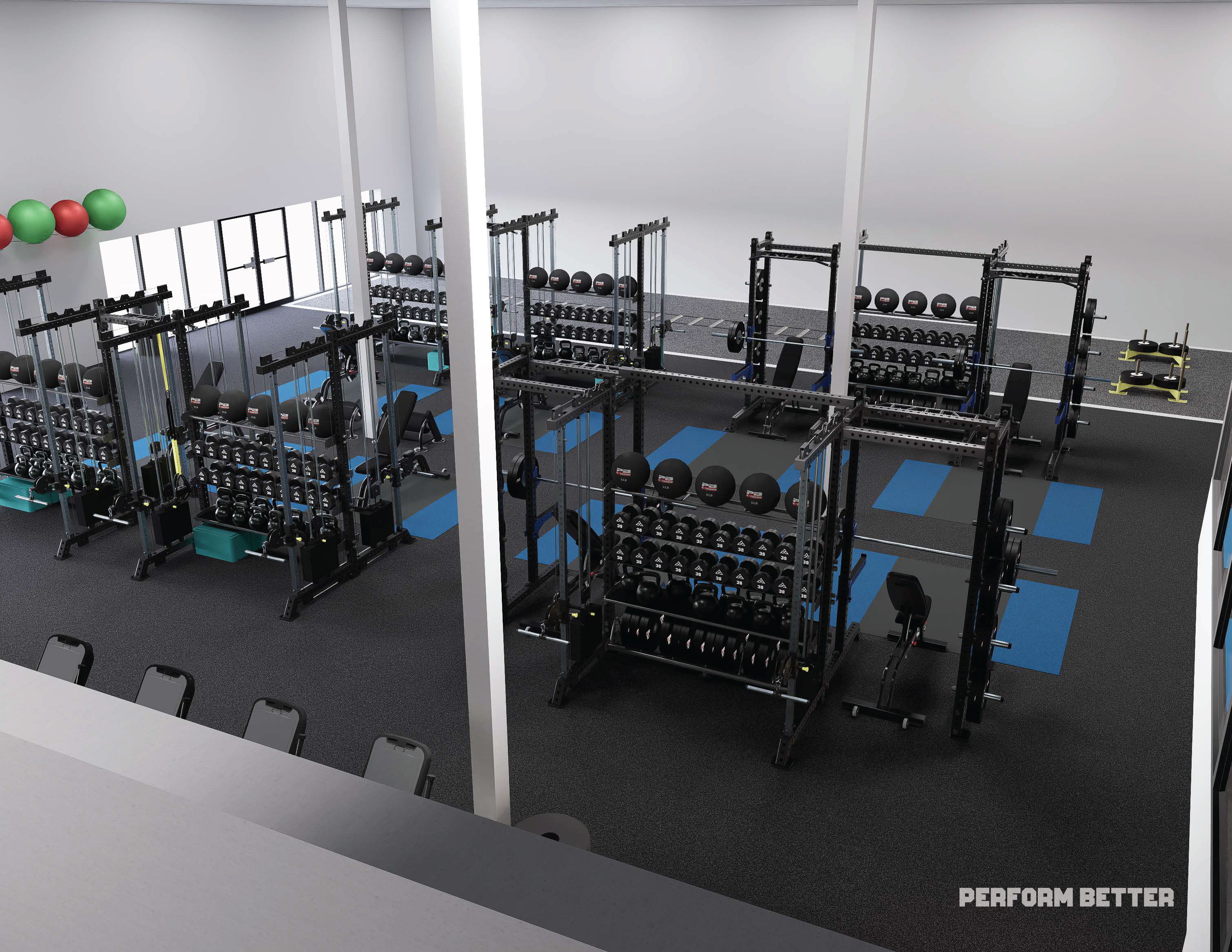 Aerial view of a modern gym with weightlifting equipment and exercise mats.