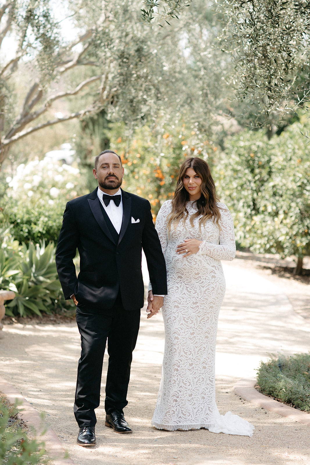 Bride and Groom holding hands