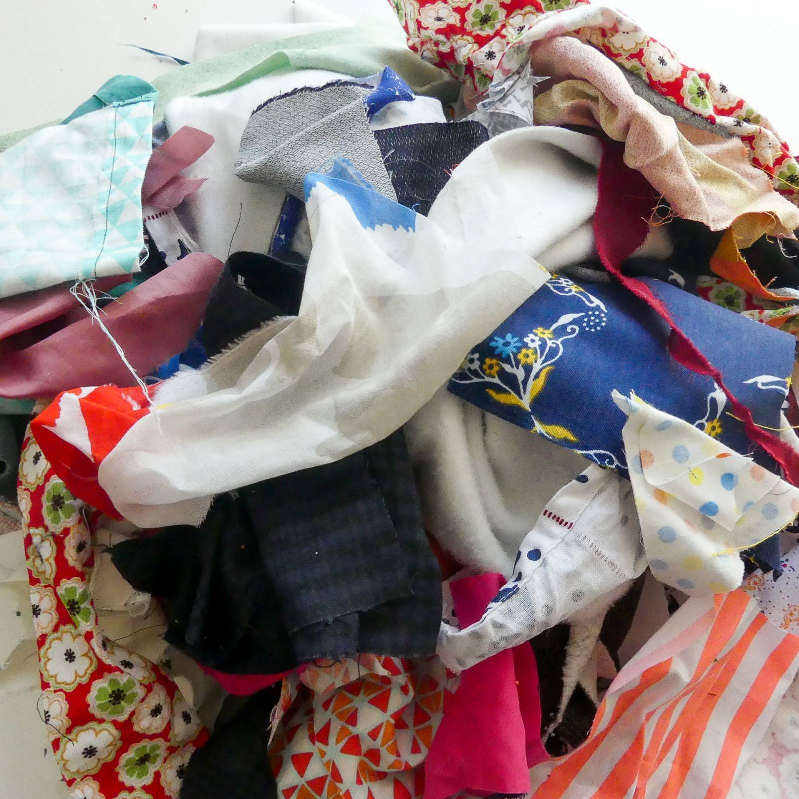 pile fabric scraps you can use for filling