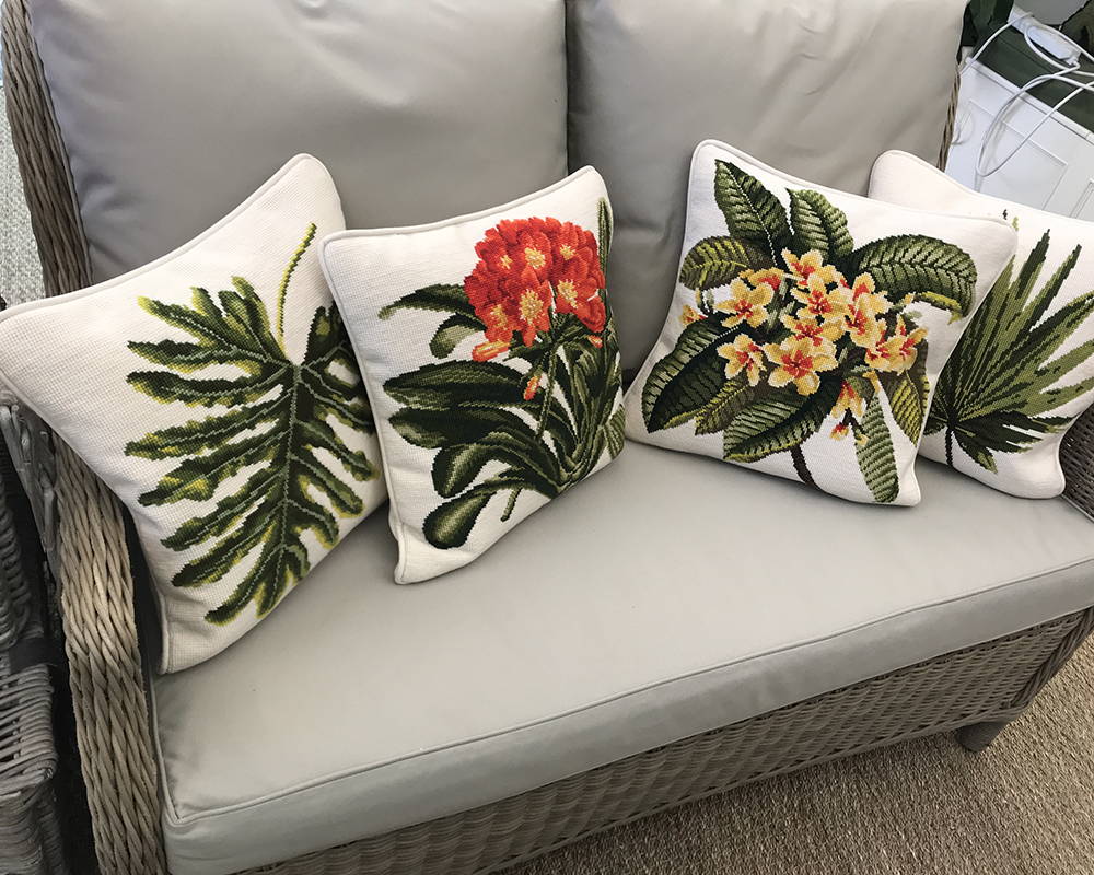 Finished Tropicals pillows on loveseat