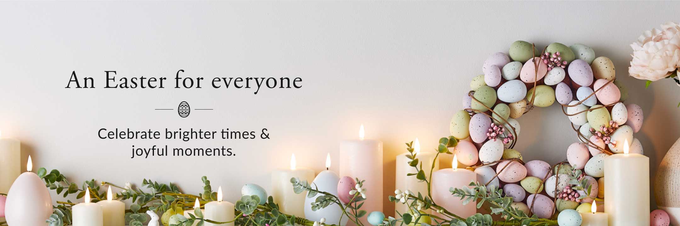 An Easter wreath and candle image reading: An Easter for everyone. Celebrate brighter times and joyful moments.