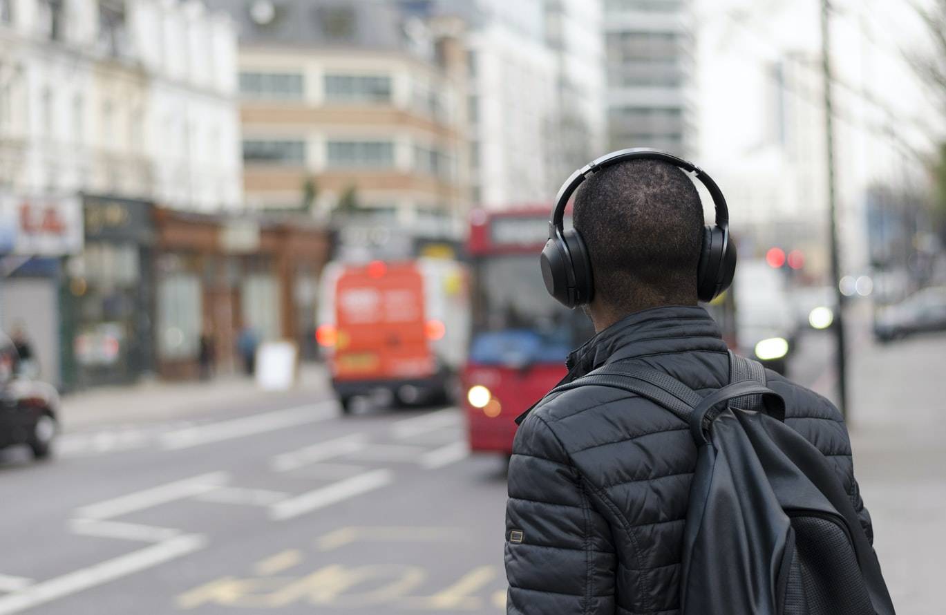 Man Wearing Headphones On The Street