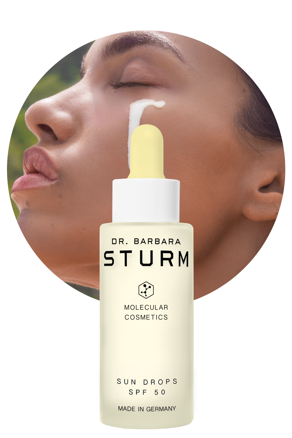 Dr. Barbara Sturm Sun Drops SPF 50 with a woman applying it to her face.