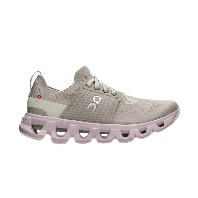 Light gray running shoe with a pink sole.