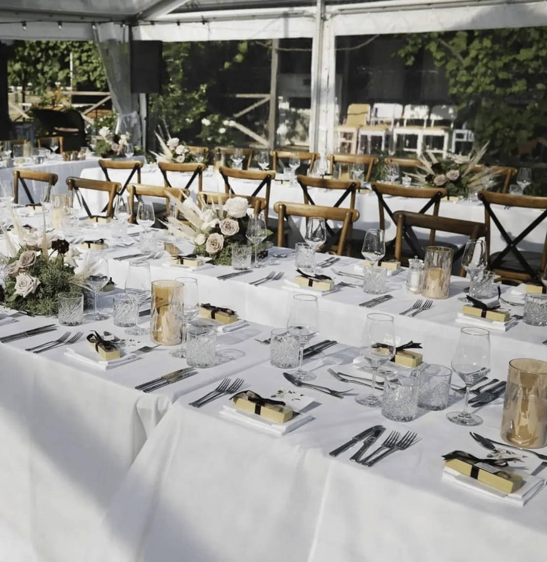 White and green table setting for wedding reception 