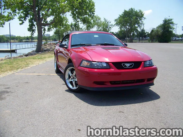 Exterior three-quarter view of Ryan's 2002 Ford Mustang convertible with HornBlasters Shocker XL train horn featured customer install gallery photo 1