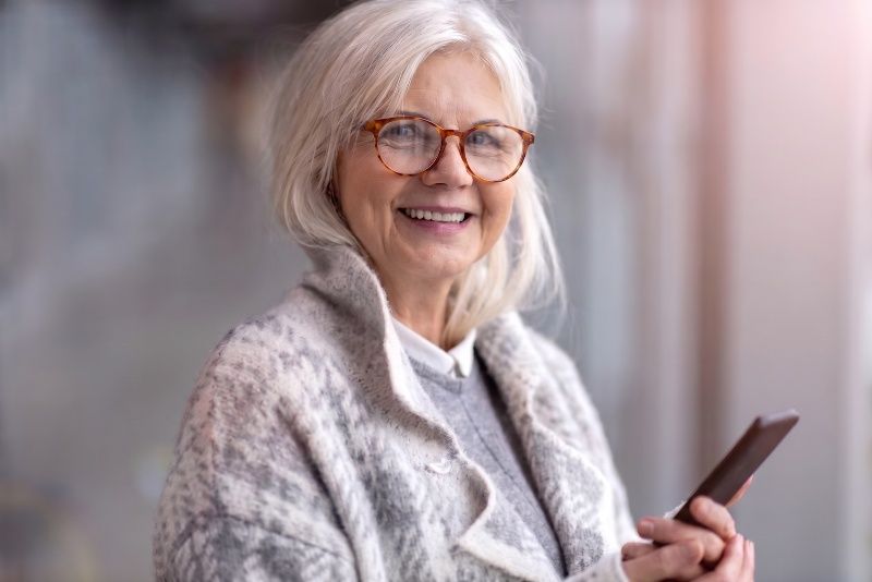 Woman wearing Hope Orange progressive glasses