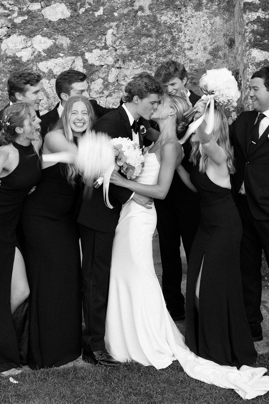 Bride and groom celebrating with friends and family