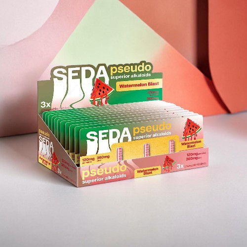 Display box of SEDA pseudo watermelon-flavored products with colorful packaging.
