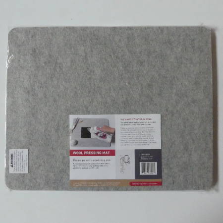 Wool pressing mat from Madam Sew in a transparent packaging