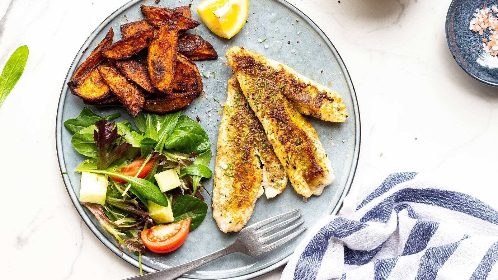 Gourmend recipe for low fodmap golden cumin fish with paprika spiced wedges