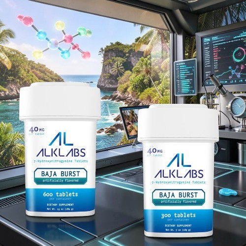 Two containers of ALKLABS BAJA BURST tablets on a futuristic desk.
