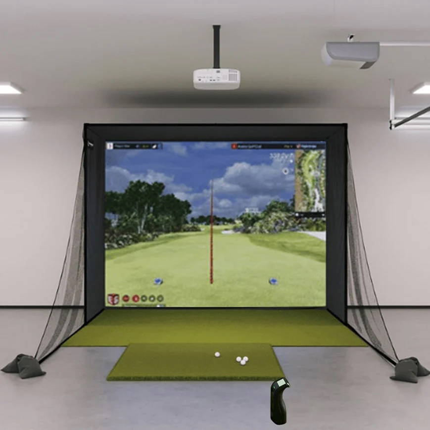 A golf simulator with Bushnell Launch Pro, golf hitting mat, landing mat, impact screen, enclosure, projector and side barrier nets.