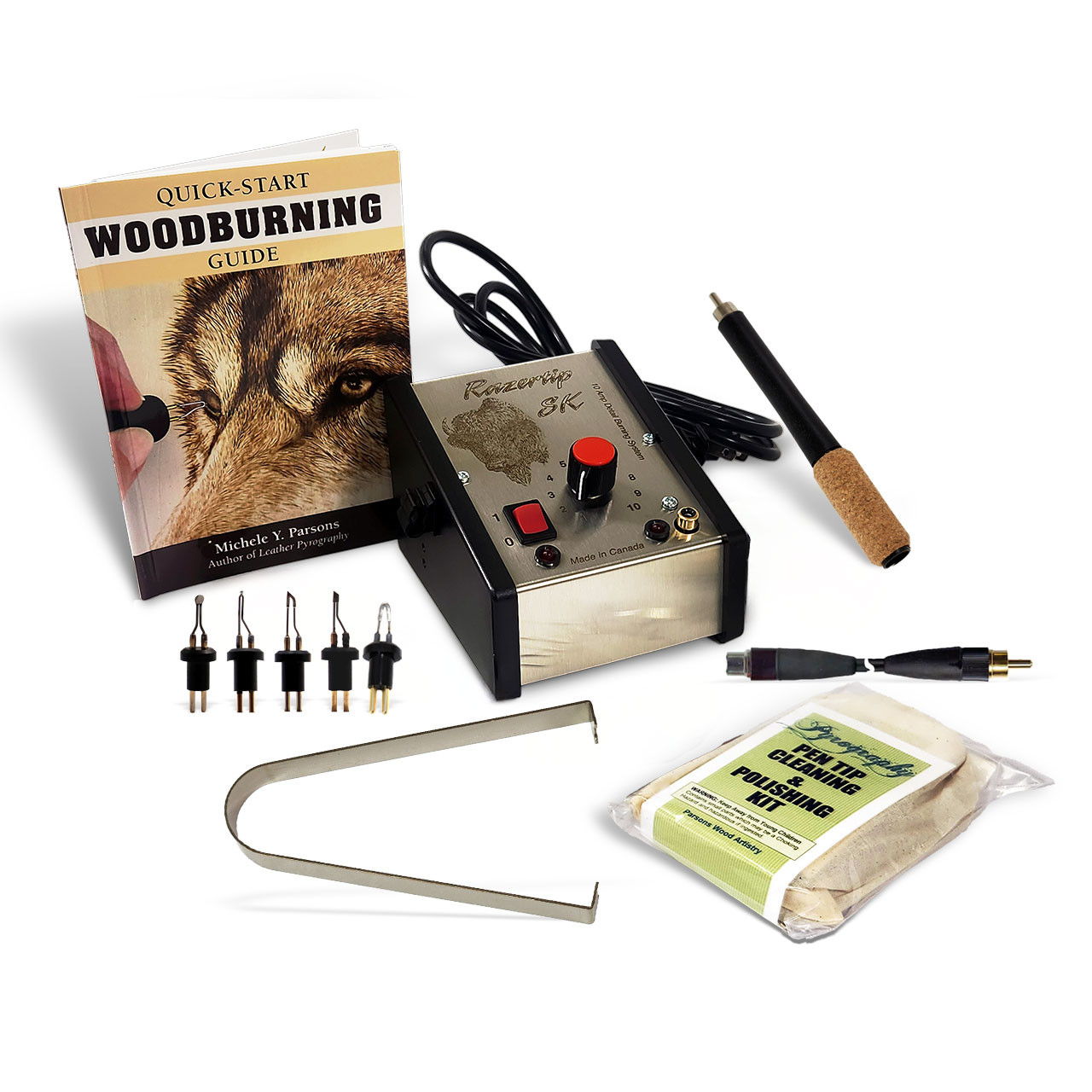 Woodburning kit with tools, instructional book, and practice materials.