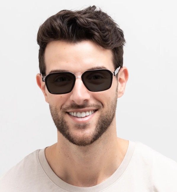Male wearing square transition lens glases