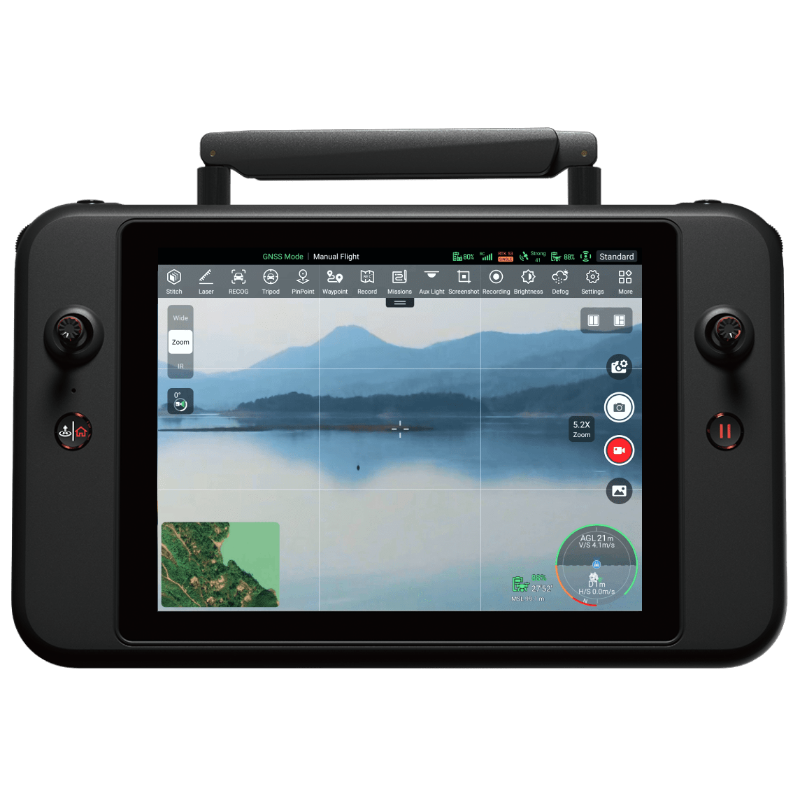 A black remote controller displaying a landscape on its screen.