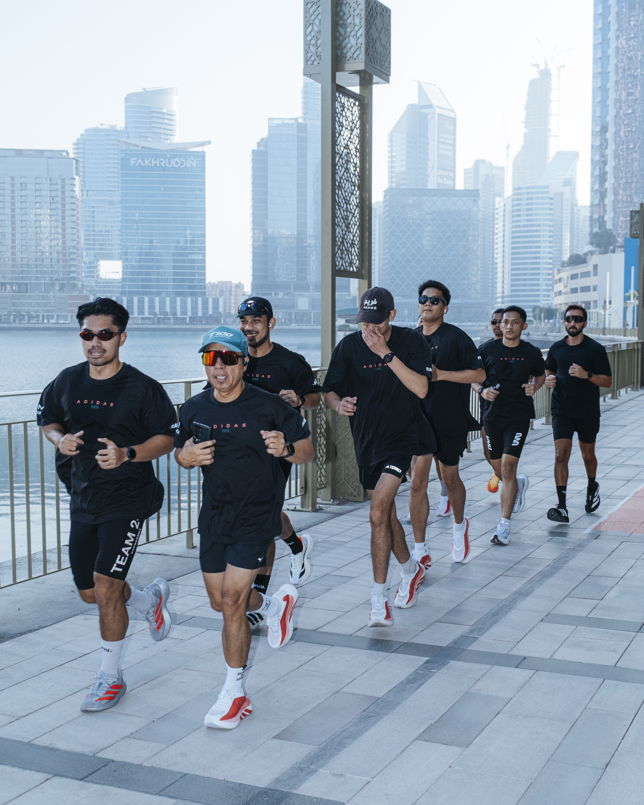 FRAME RUN CLUB runners along the Dubai Canal