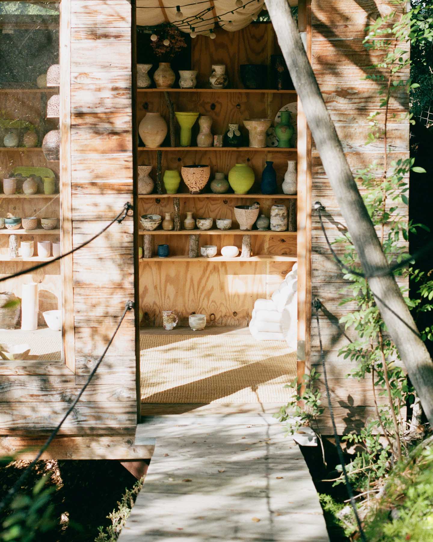 Image of the doorway into Raina Lee's treehouse studio.