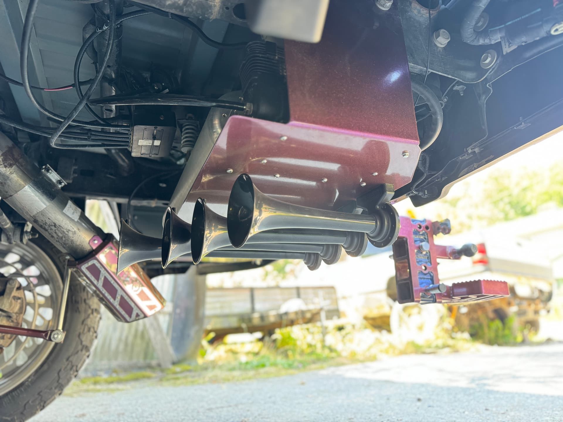 Side profile or rear-quarter Chris' 2022 Ram 2500 HornBlasters Shocker XL train horn kit customer install gallery photo 3