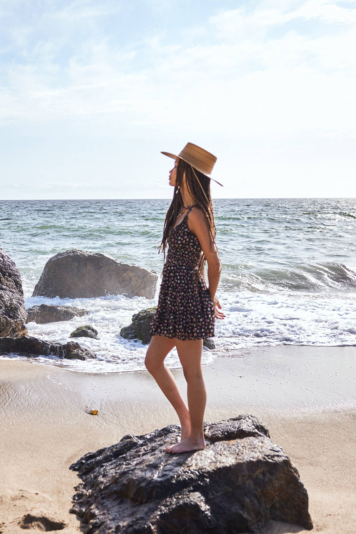 Trixxi sun-kissed summer, girl at oceanside beach sane in ditsy floral tier tank dress.
