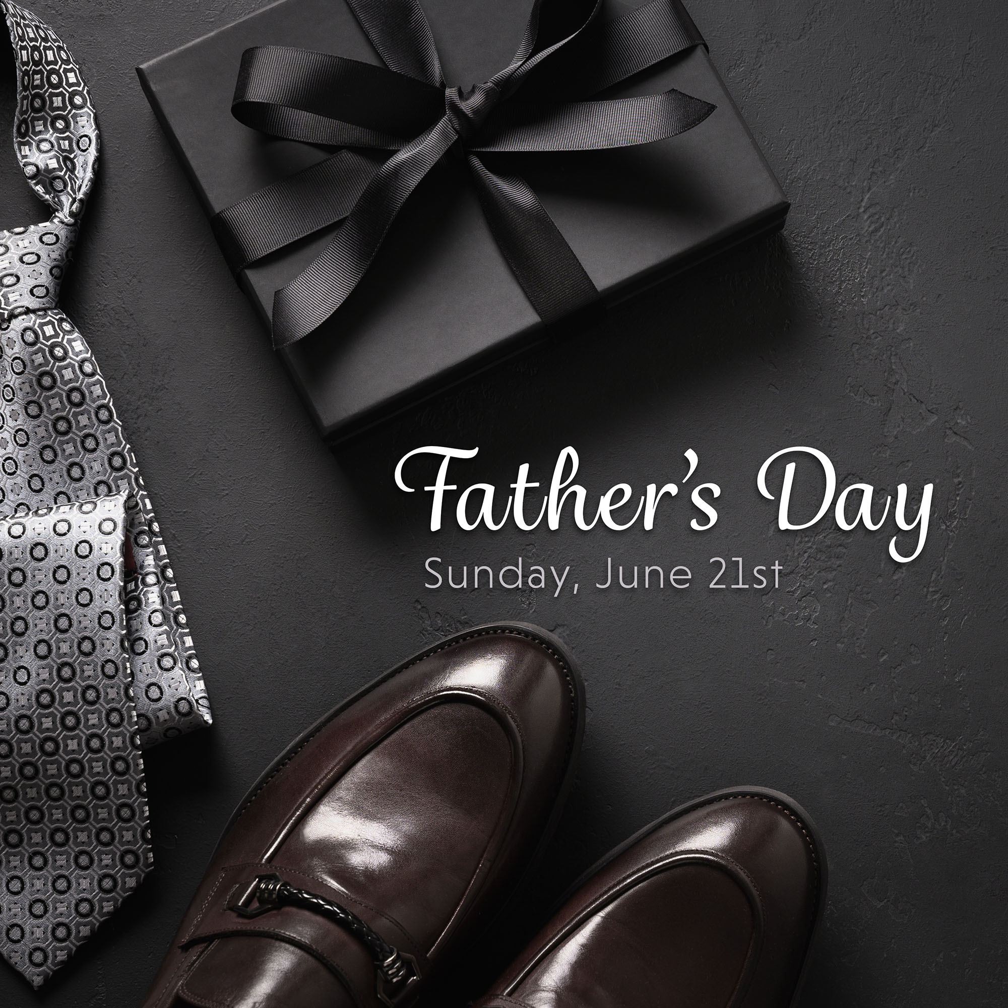 Father's Day gift with a tie and shoes, date June 21st.