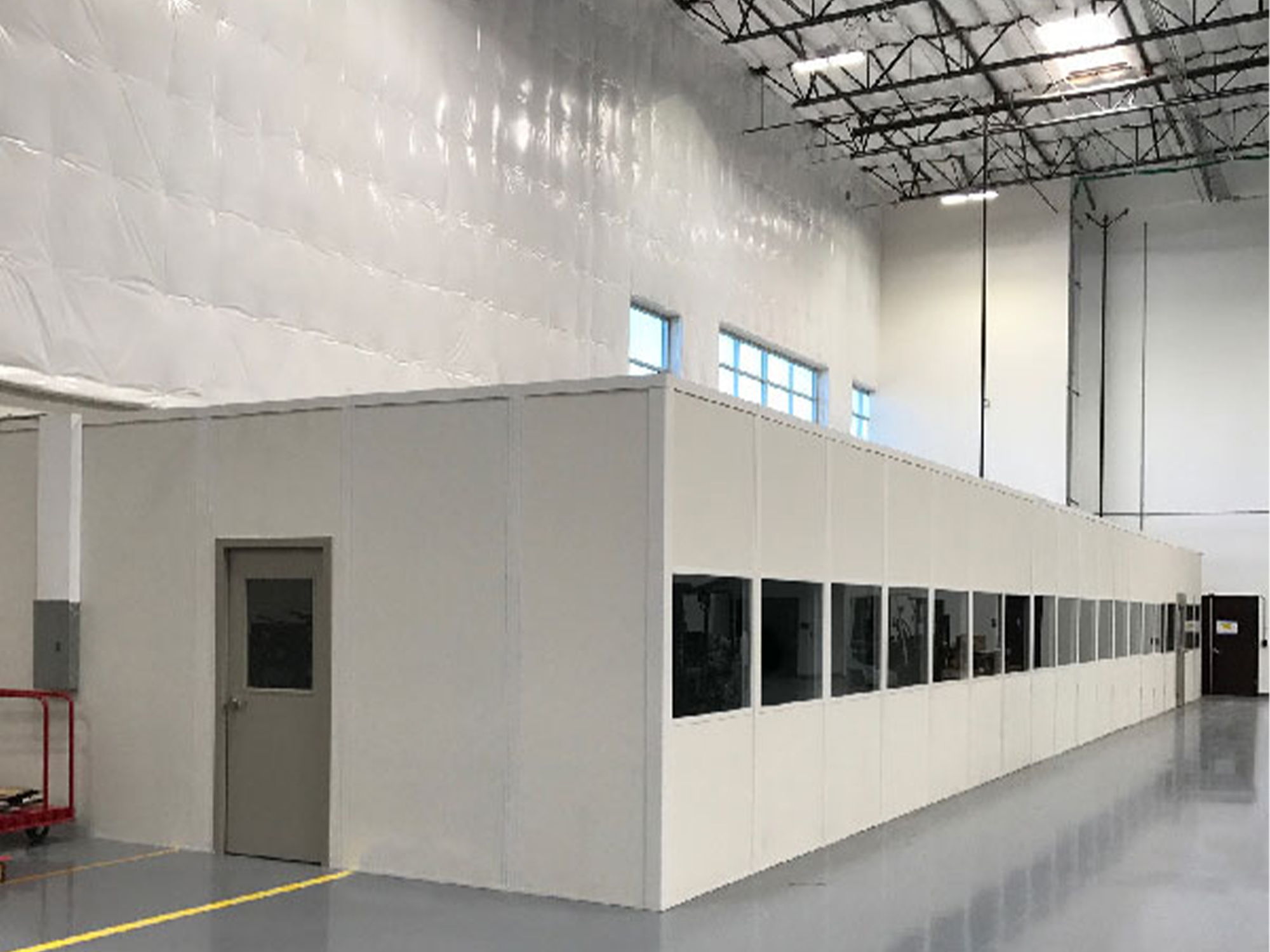 Interior view of a modern building with a partitioned area.