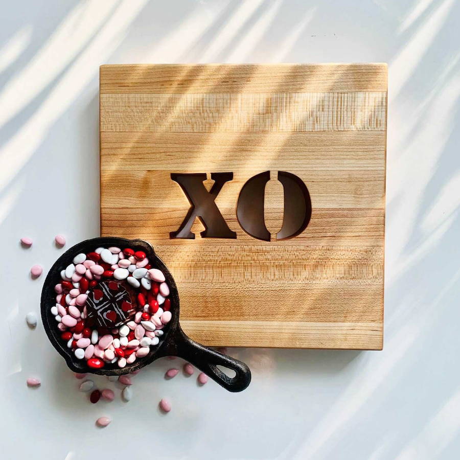 Wooden Trivet with XO engraved in it