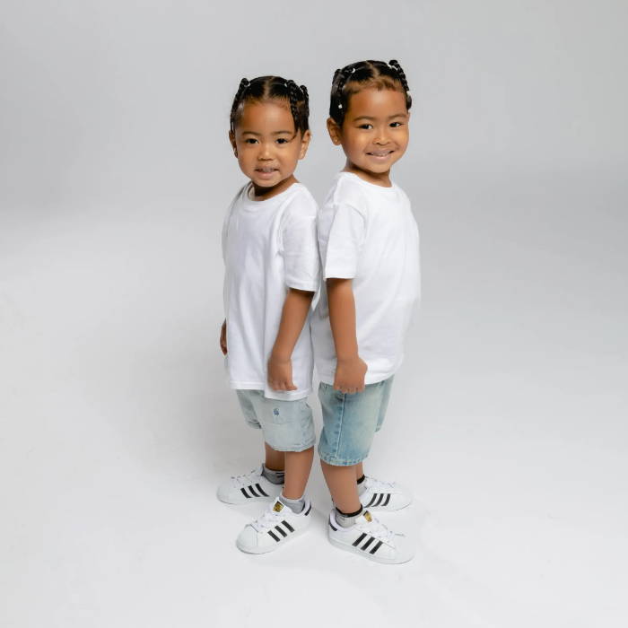 twin boys wearing adidas superstars
