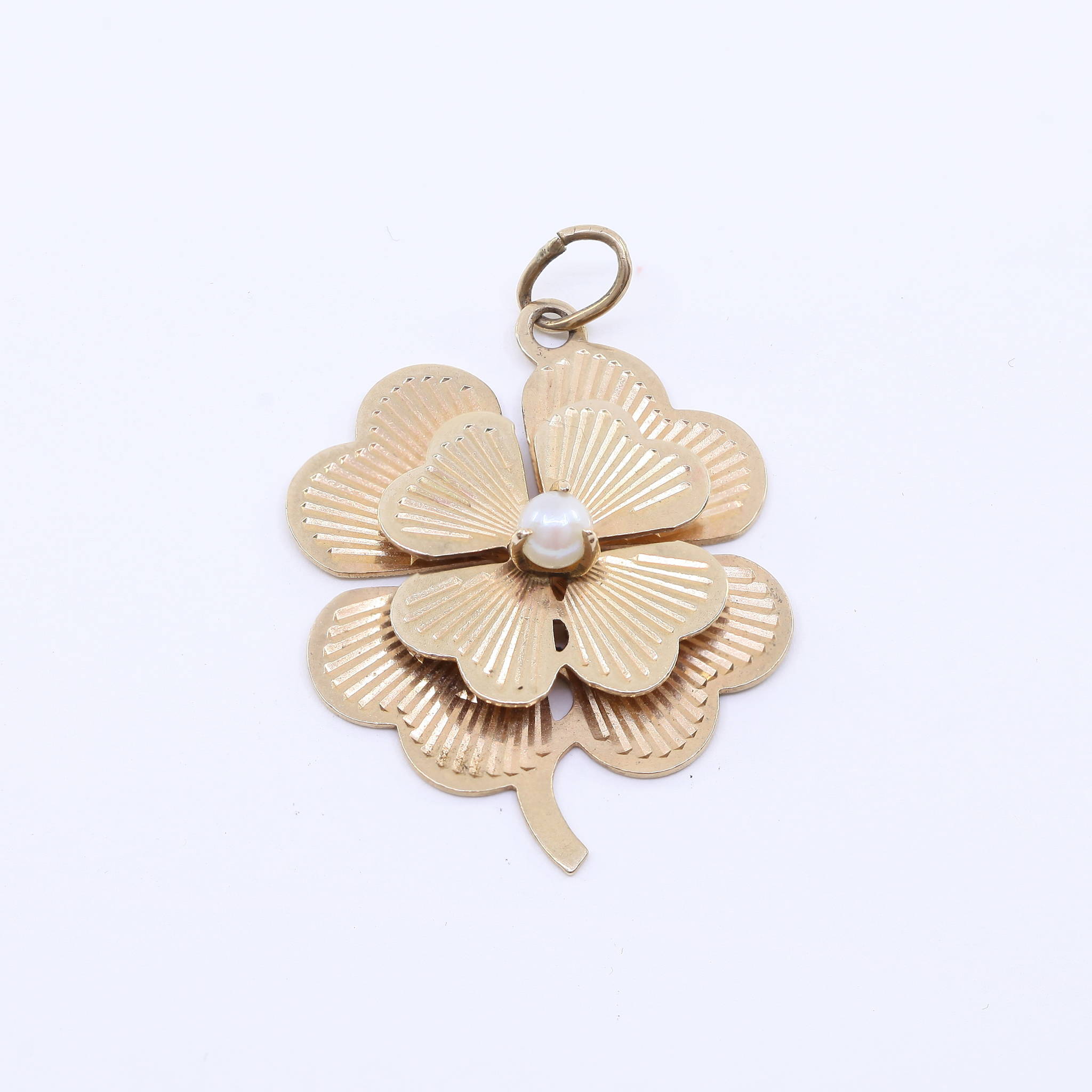 pearl and yellow gold four-leaf clover charm
