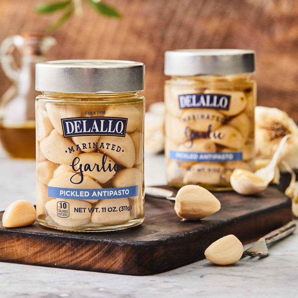Two jars of DeLallo Marinated garlic