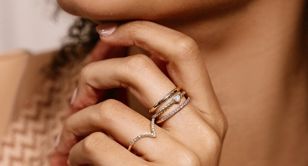Ethical stackable bands with accenting lab diamonds in recycled gold
