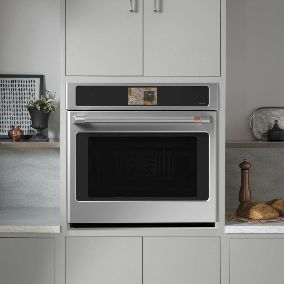 A modern built-in microwave oven in a sleek kitchen setting.