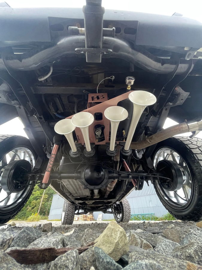Spare tire well horn bell mounting or air hardware during Conductor's Special install on Somer's GMC Sierra photo 2
