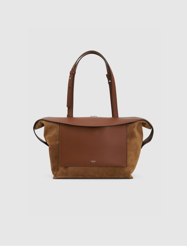 Brown leather and suede handbag with two handles.