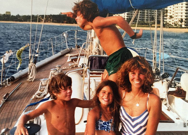 Old photo of the Kirsch family on a sail boat. 