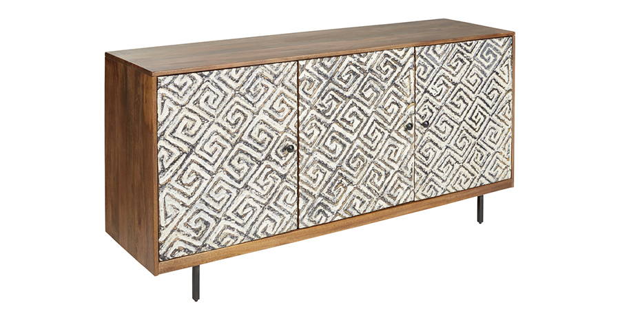 Wood cabinet with carved motif doors.