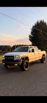 Owen's white 2001 Chevrolet Silverado 2500HD sunset front three-quarter thumbnail