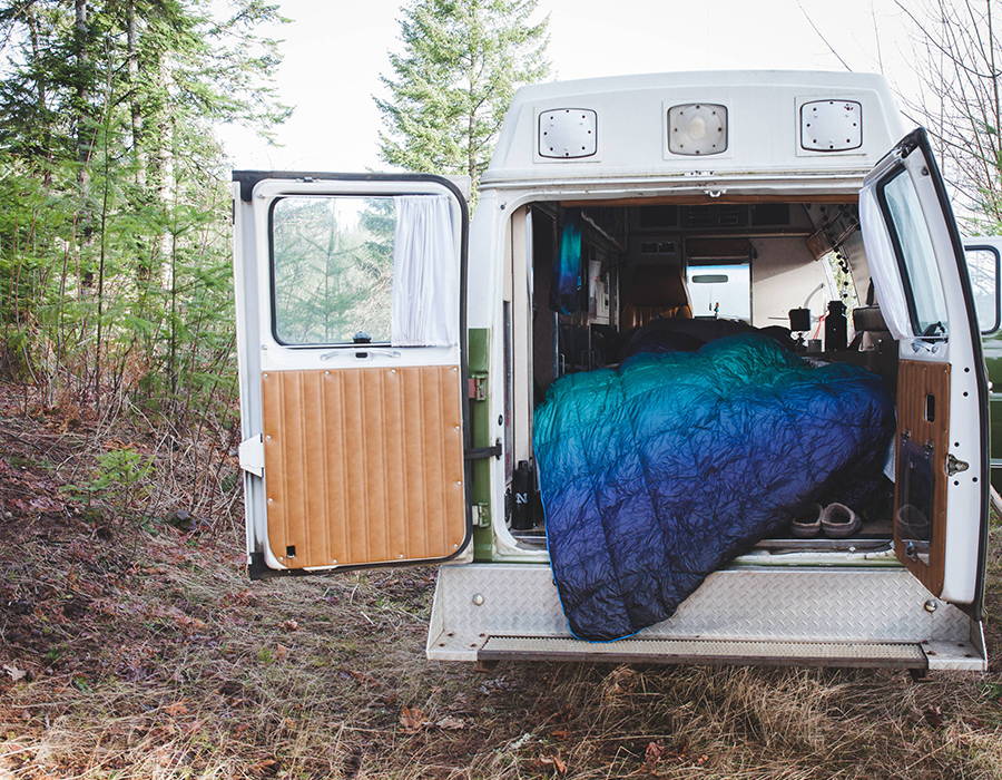 Rumpl's travel van paired with our Down Puffy Blanket hanging out fo the back 