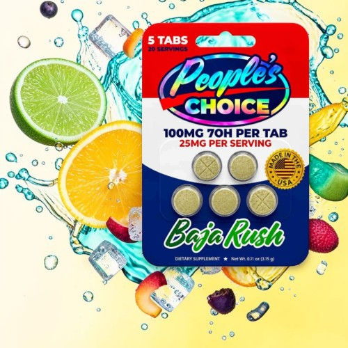 Pack of tablets surrounded by colorful fruits and splashes of water.