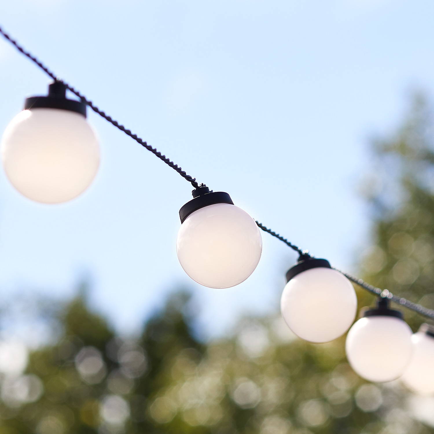 White festoons in an outdoor setting