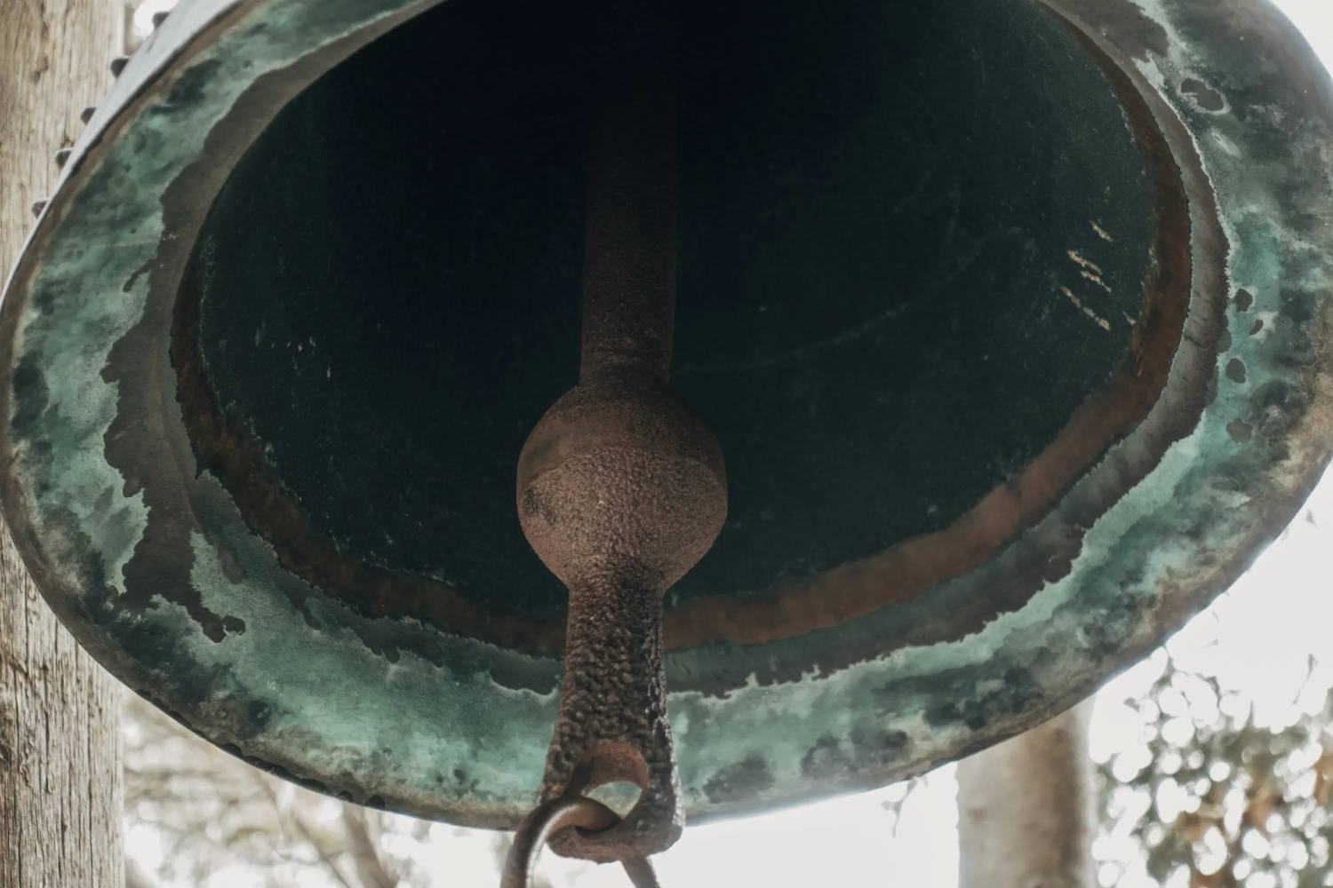 Close up of a tarnished bell