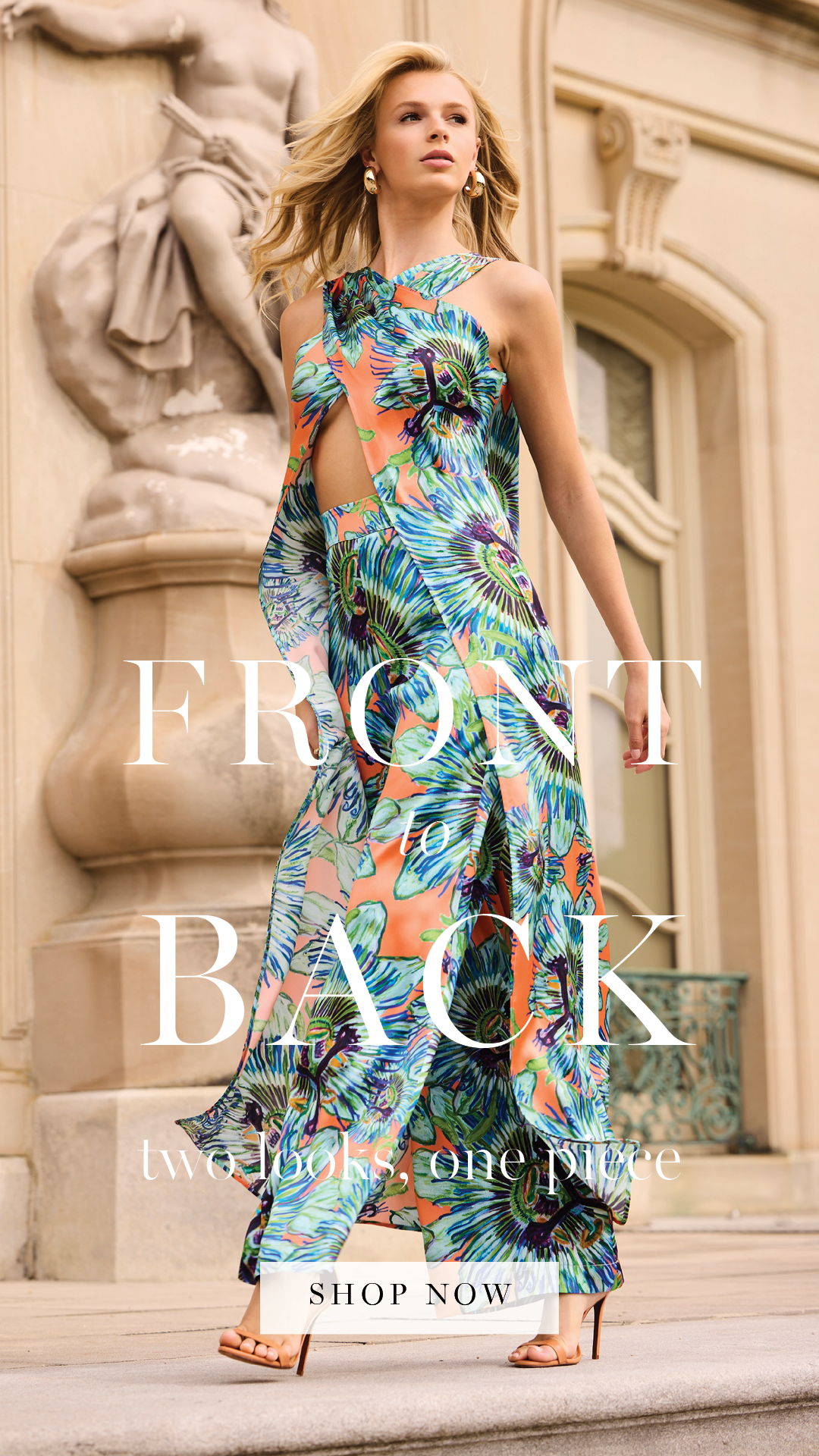 Model wearing vibrant tropical dress with 