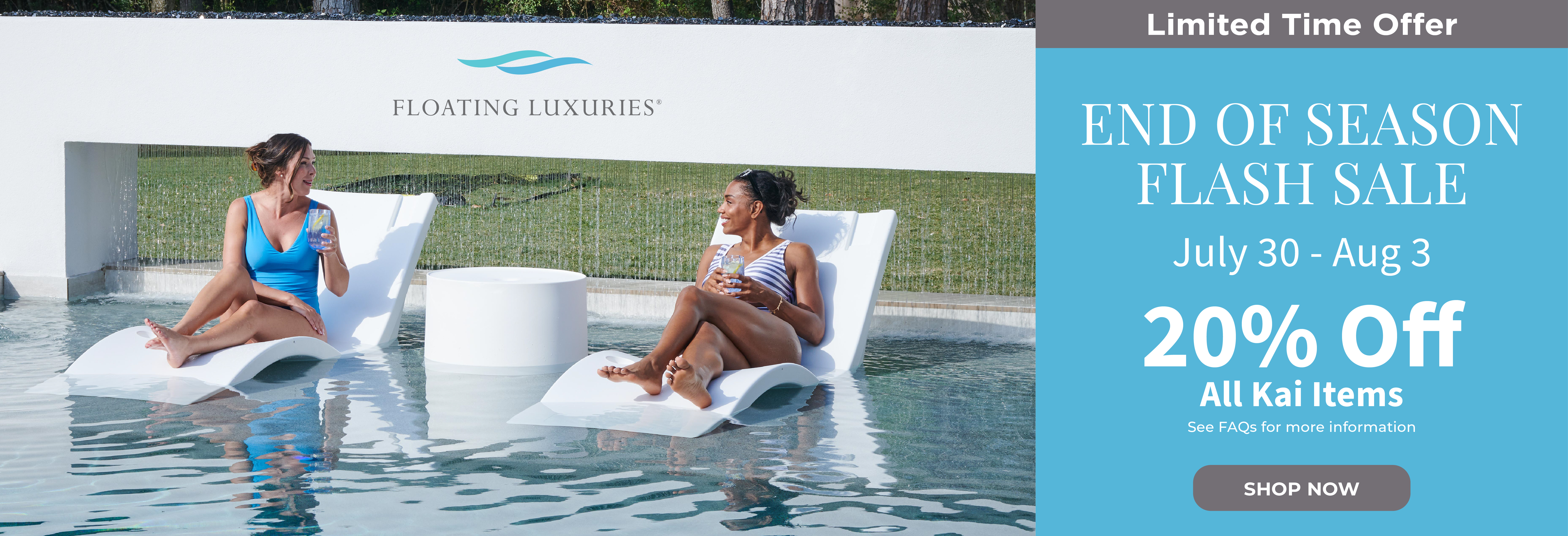Two women relaxing by a pool during a sale event.