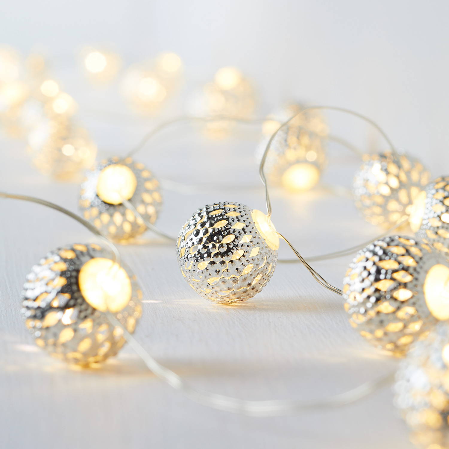 Moroccan fairy lights illuminated on table