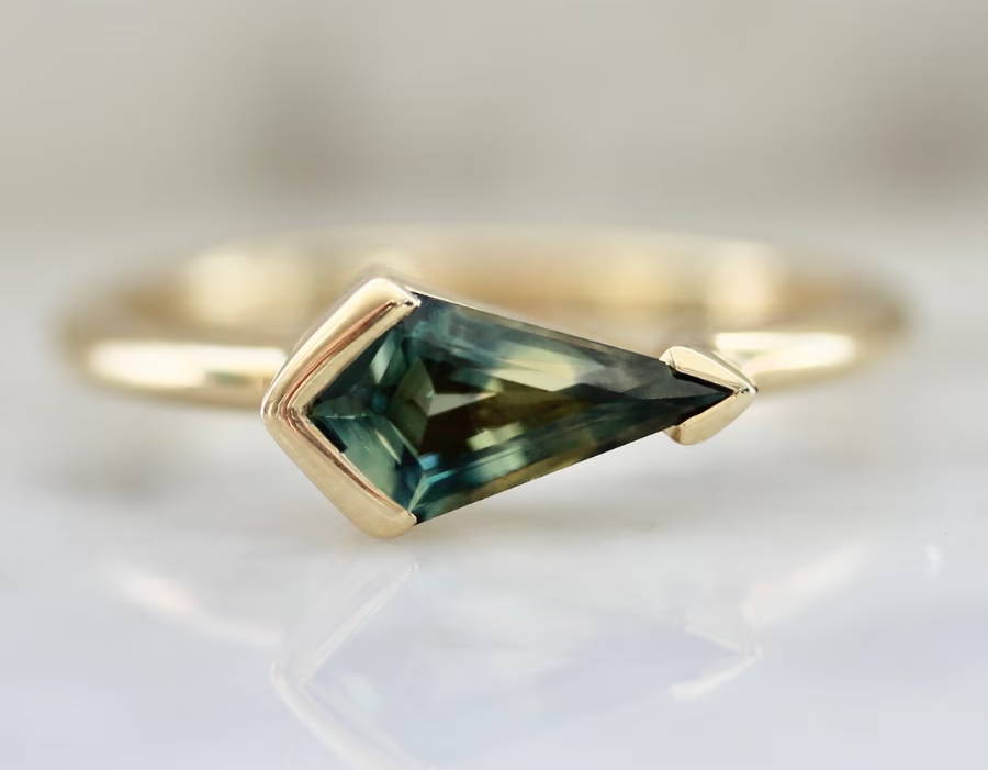 Green-yellow bi-color kite cut sapphire ring in half bezel setting