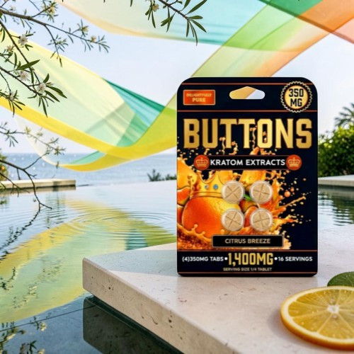 Kratom extract packaging near a pool with colorful drapes and a lemon slice.
