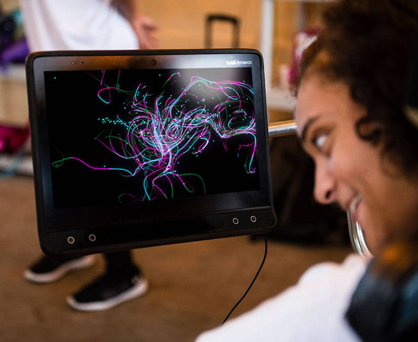 Girl playing Color Trails game in Magic Eye FX 